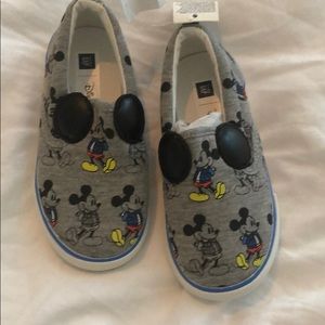 NWT. Never worn. Disney slip on for toddler